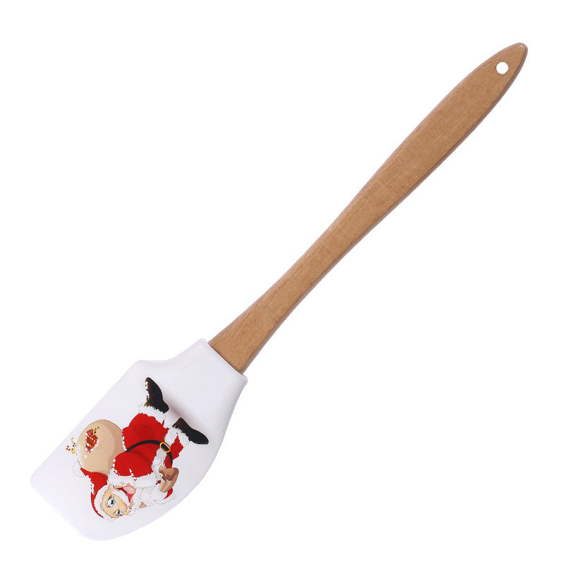 Spatule Crème de Noël en Silicone – Sapin, Père Noël & Bonhomme de Neige 🎁
