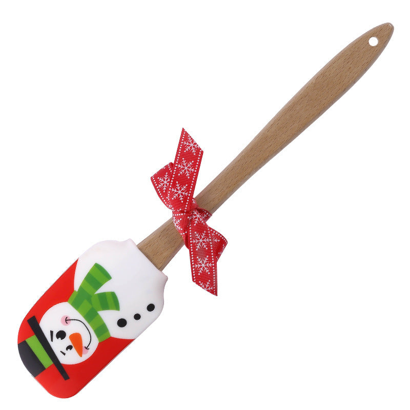Spatule Crème de Noël en Silicone – Sapin, Père Noël & Bonhomme de Neige 🎁