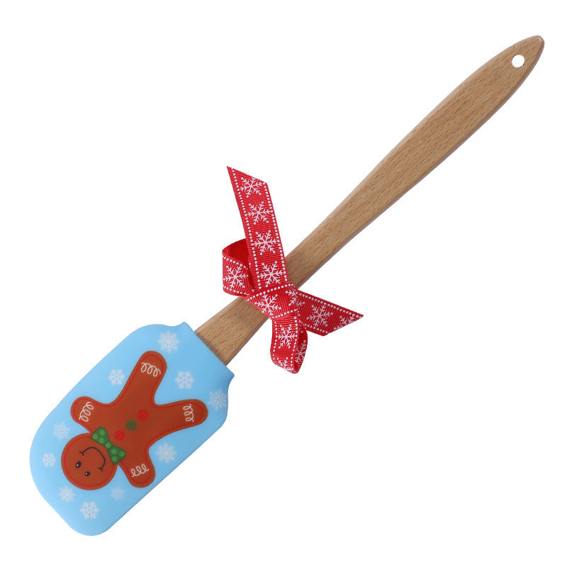 Spatule Crème de Noël en Silicone – Sapin, Père Noël & Bonhomme de Neige 🎁