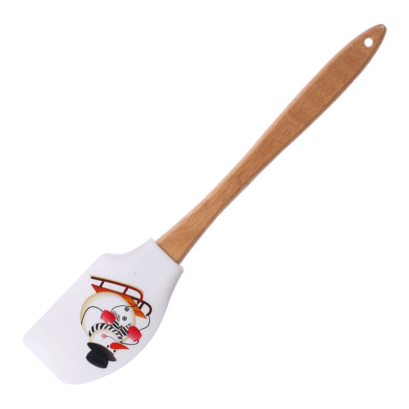 Spatule Crème de Noël en Silicone – Sapin, Père Noël & Bonhomme de Neige 🎁