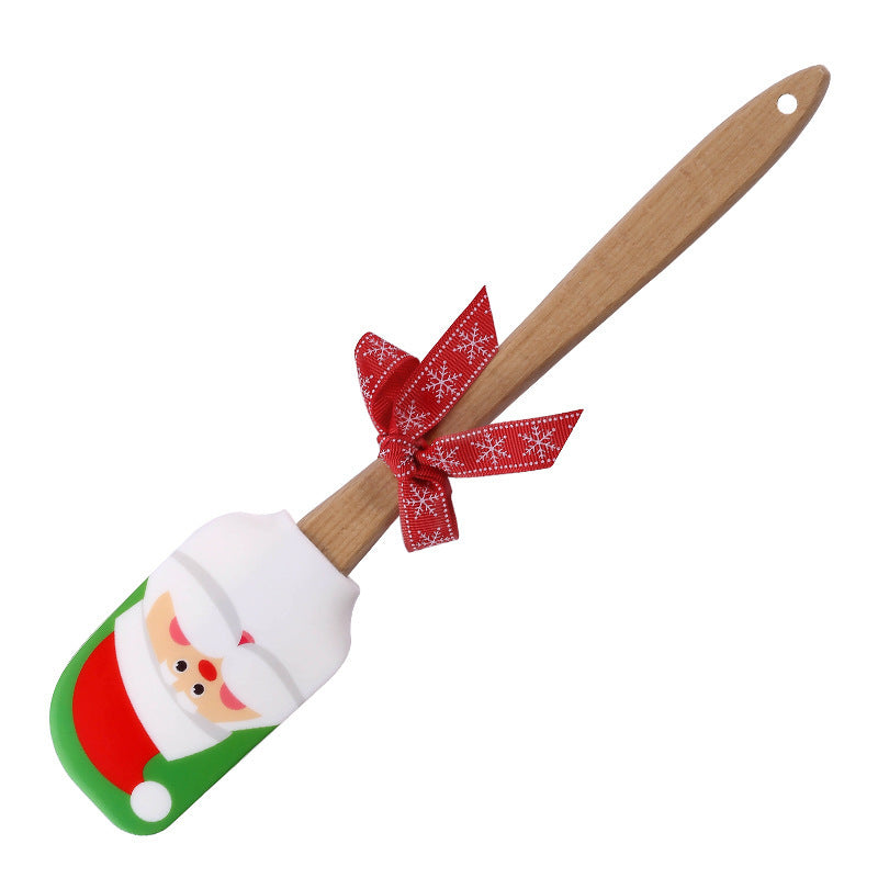 Spatule Crème de Noël en Silicone – Sapin, Père Noël & Bonhomme de Neige 🎁