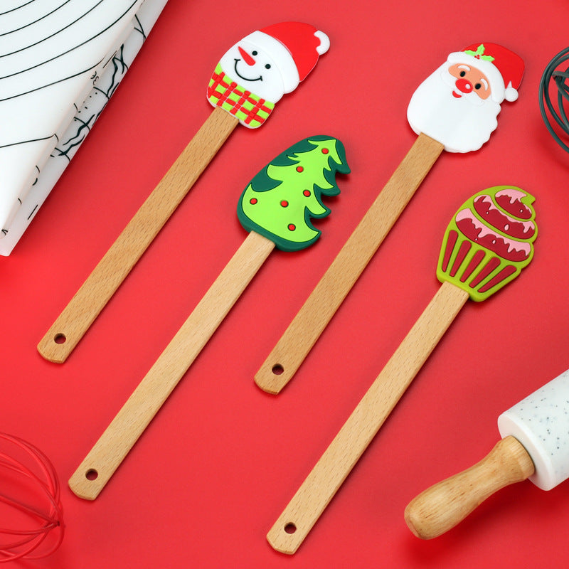 Spatule Crème de Noël en Silicone – Sapin, Père Noël & Bonhomme de Neige 🎁